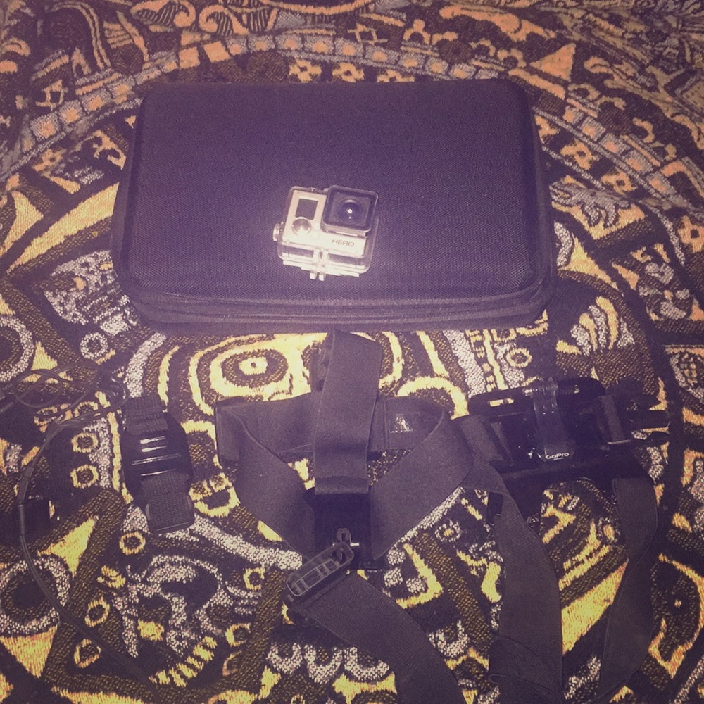 Go pro hero 3 with 2 accessories